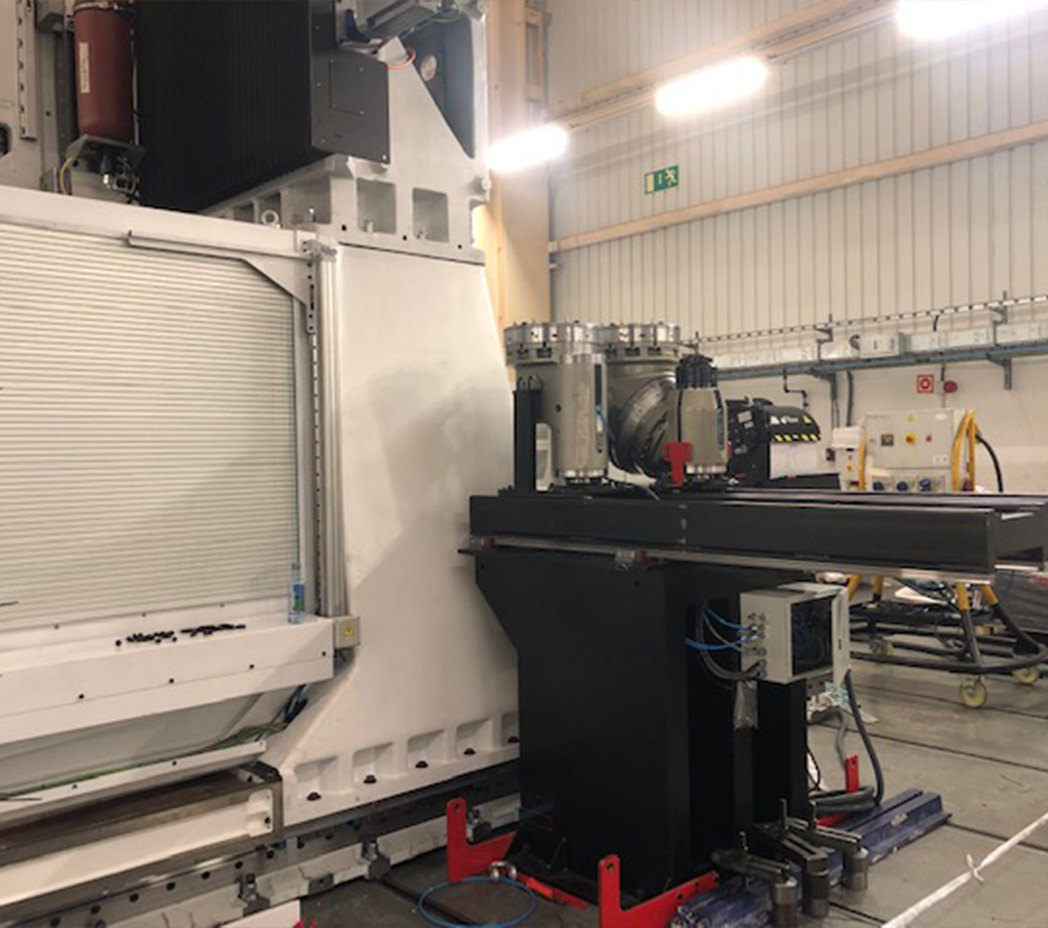 ESTACIÓN DE CABEZALES Y MAMPARA AUTOMÁTICA MÁQUINA HERRAMIENTA